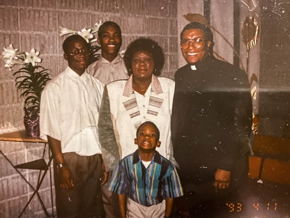 Harrison as a child with his family